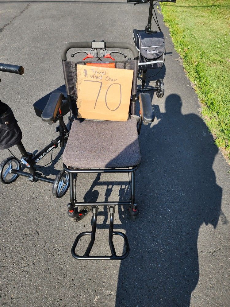 Travel Wheelchair Flods Down And Has Luggage Handle