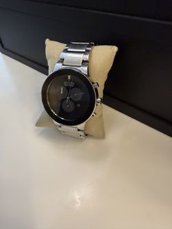 Authentic Citizen Men’s Chronograph Watch in polished stainless steel with a sleek black minimalist dial.