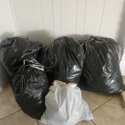 4 Bags Of Clothes Different Sizes Women Men Boy Girls