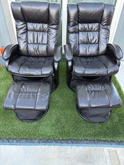 Pair of Black Leather Recliner Chairs with Ottomans