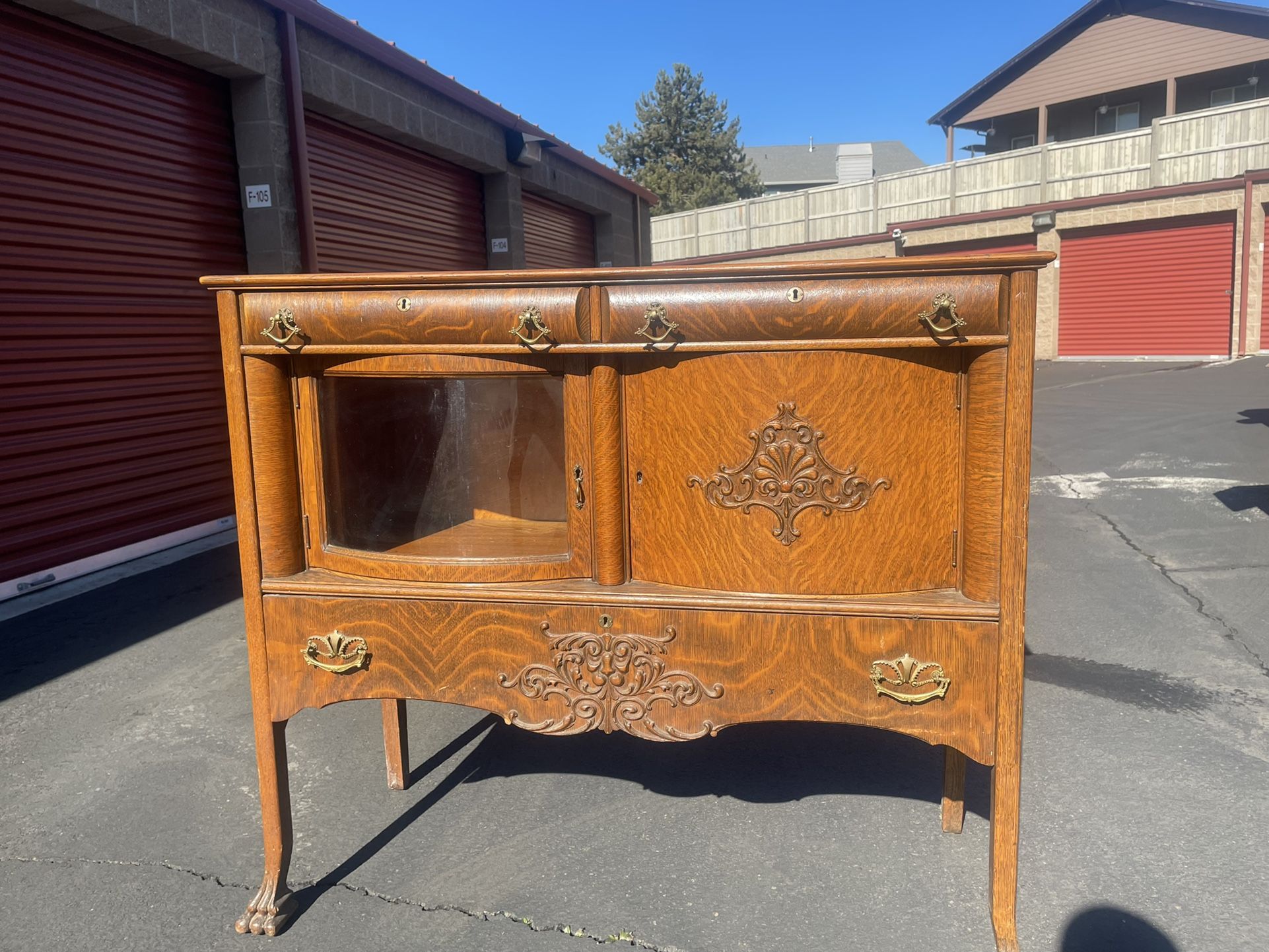 Antique 1900 Oak Side Board With Glass Door And Claw Feet