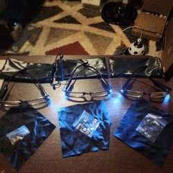 Three Pack Reading Glasses With Light And Magnifier