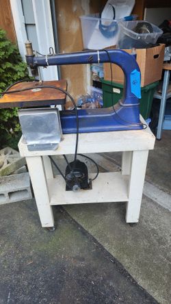 Table Top Jig Saw. Table On Rollers