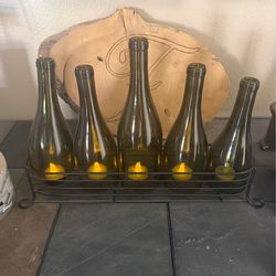 Wine bottle tea candle decor