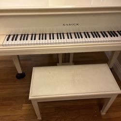 White Baby Grand Piano