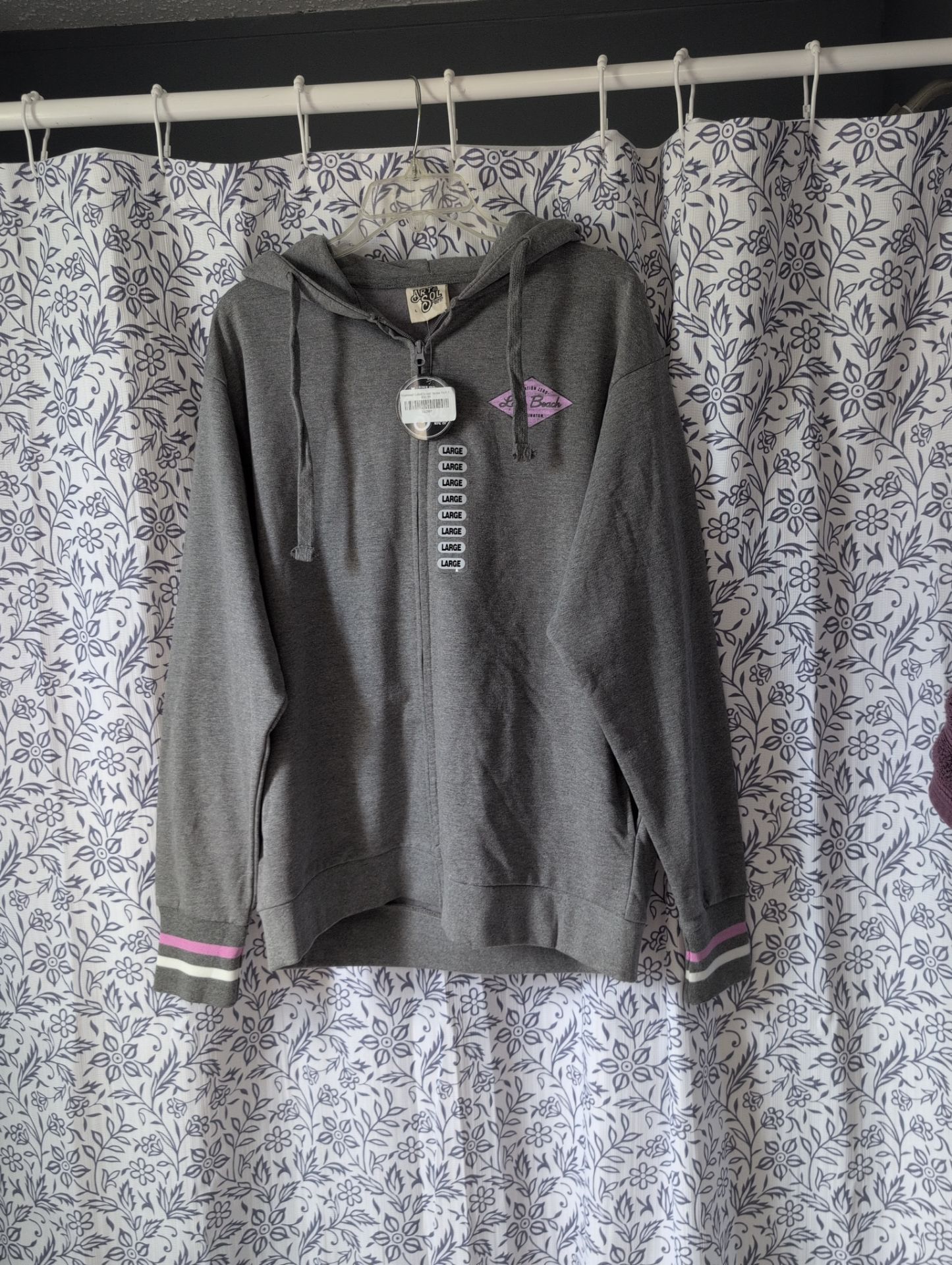 New with tags Adult size large hooded sweatshirt