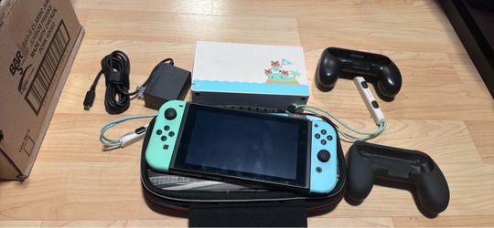 Nintendo switch animal, crossing with docking station, charger, joy, con grips, and wrist straps no trades cash only see my other listings for more ga