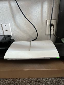 PS3 Super  Slim with 9 Games and 3 Controllers