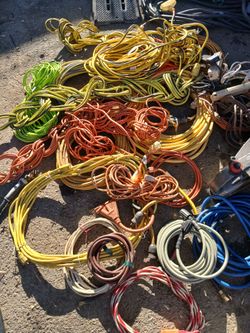 Misc extension cords,leads and hoses.