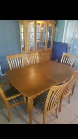 Birds eye maple dining room set. , china cab, and side server must see!, must go!