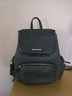 Mochila mk original  en buenas condiciones