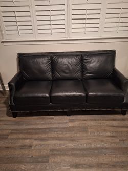 Sofia Vergara Black Leather Studded Sofa