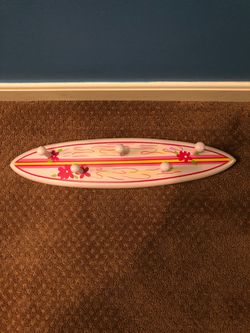 Wall hanging on surfboard