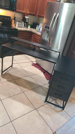 Beautiful large L shape desk has 3 drawers and charging station with USB plugs as well and side storage pocket $180 cash must pick up Broadway and apa