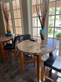 Round bar top tables with chairs