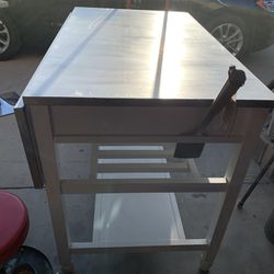 stainless steel covered kitchen table