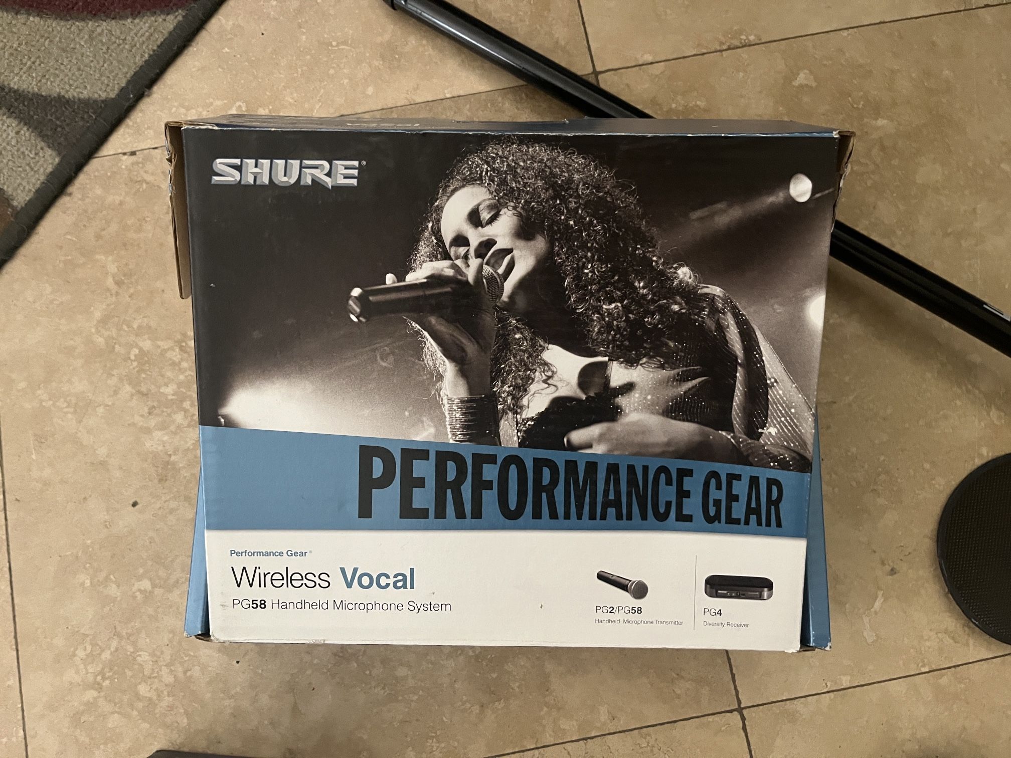 A Sampling Of Audio Equipment Including PG58 Mic
