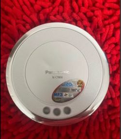Panasonic SL-CT800 Portable CD Player  Vintage Panasonic SL-CT800 portable CD player in silver. This device has MP3 playback capability and a slim, ci