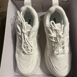 Burned brand new sneakers, size 7.  BERNESS Gianna Sneaker