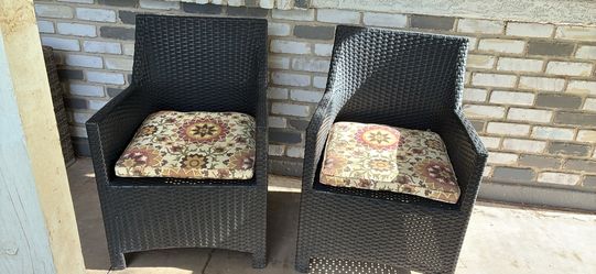 Two Resin wicker chairs