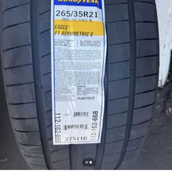265/35R21