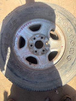 2004 Chevy 16 in spare wheel with tire