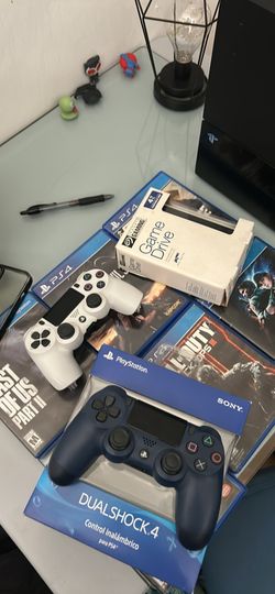 PlayStation fat 2 controllers 6 games and if u like I can sell the 4tb external memory at an extra charge, goes with best offer