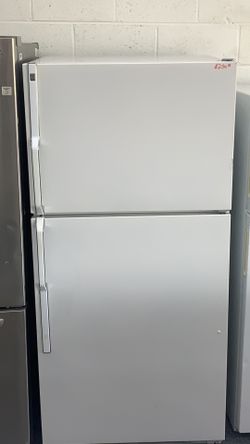 Ge top and bottom fridge with warranty