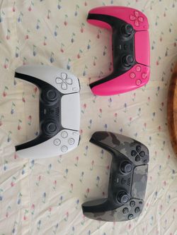 Three PlayStation 5 controllers w/ stick drift