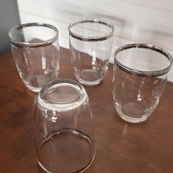 Set of 4 vintage glass with silver rims