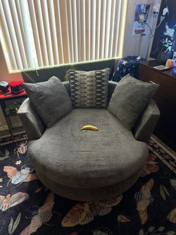 grey circular couch