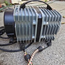                         This device is an Elemental Solutions EOCP284 commercial-grade utility pump, commonly used in hydroponics, ponds, and water ae