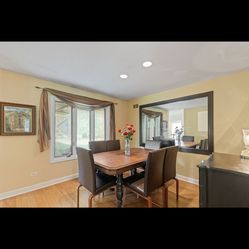 Dining room table with butterfly leaf and  six chairs