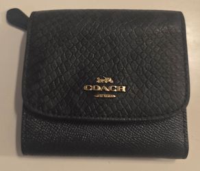 Navy blue Authentic Coach wallet.