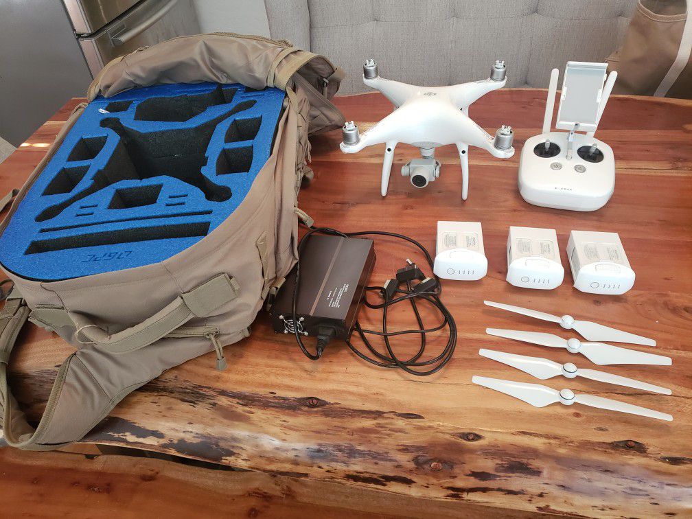 Phantom 4 pro with 3 batteries and backpack