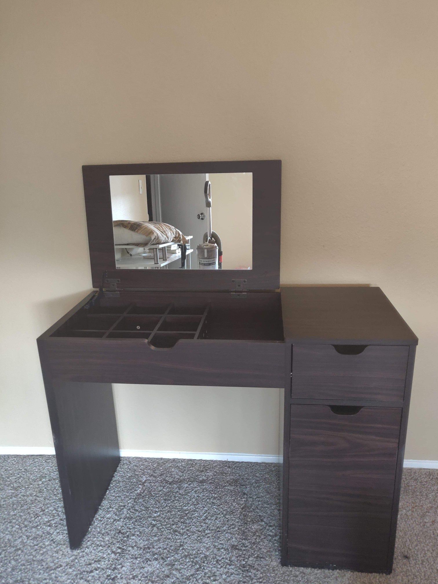 Vanity with mirror and chair
