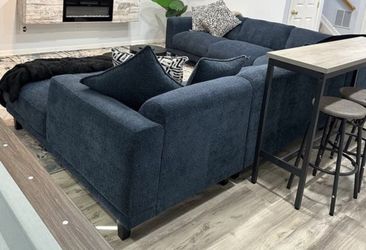 Blue Four Piece Sectional couch In Great Condition.