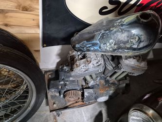 Harley art burned up engine make table out of it are bar Kool stuff
