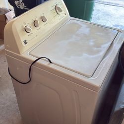 Washing Machine. Works but Makes A Loud Noise.