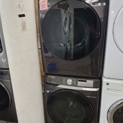 Black Stainless Used Samsung Front Load Washer And NEW Electric 220volt Stackable Dryer Set