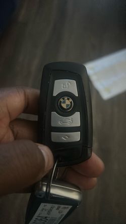 OEM BMW Comfort Access smart key.