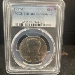 1977 D Brilliant Uncirculated Kennedy Half Dollar Graded By PGCS 5-20