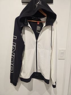Under Armour UA Baseline Full Zip Woven Jacket (número de estilo 1317413). 