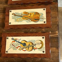 set of 4  6x12 wood plaques with cardstock musical instruments tacked to front  1960’s-70’s vintage 