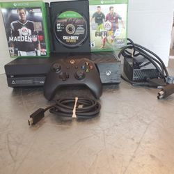 Microsoft Xbox one gaming system with games