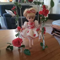 Doll On Swing