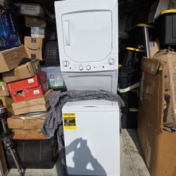 24-inch wide, white electric stacked laundry center with a 2.3 cu. ft. capacity washer and 4.4 cu. ft.