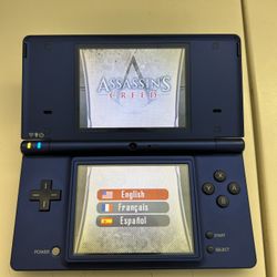 Nintendo DSI WITH GAMES and Power Supply And Storage Card. 