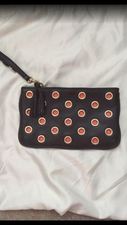 COACH grommet wristlet