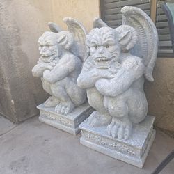 Gargoyles cased in cement